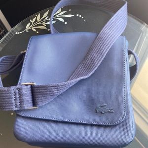 Navy Blue Lacoste crossbody bag.